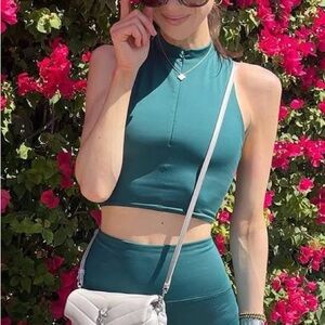 Reformation green athletic tank top. Size small